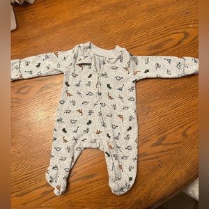 Grey boys onesie with orange and blue dinosaurs